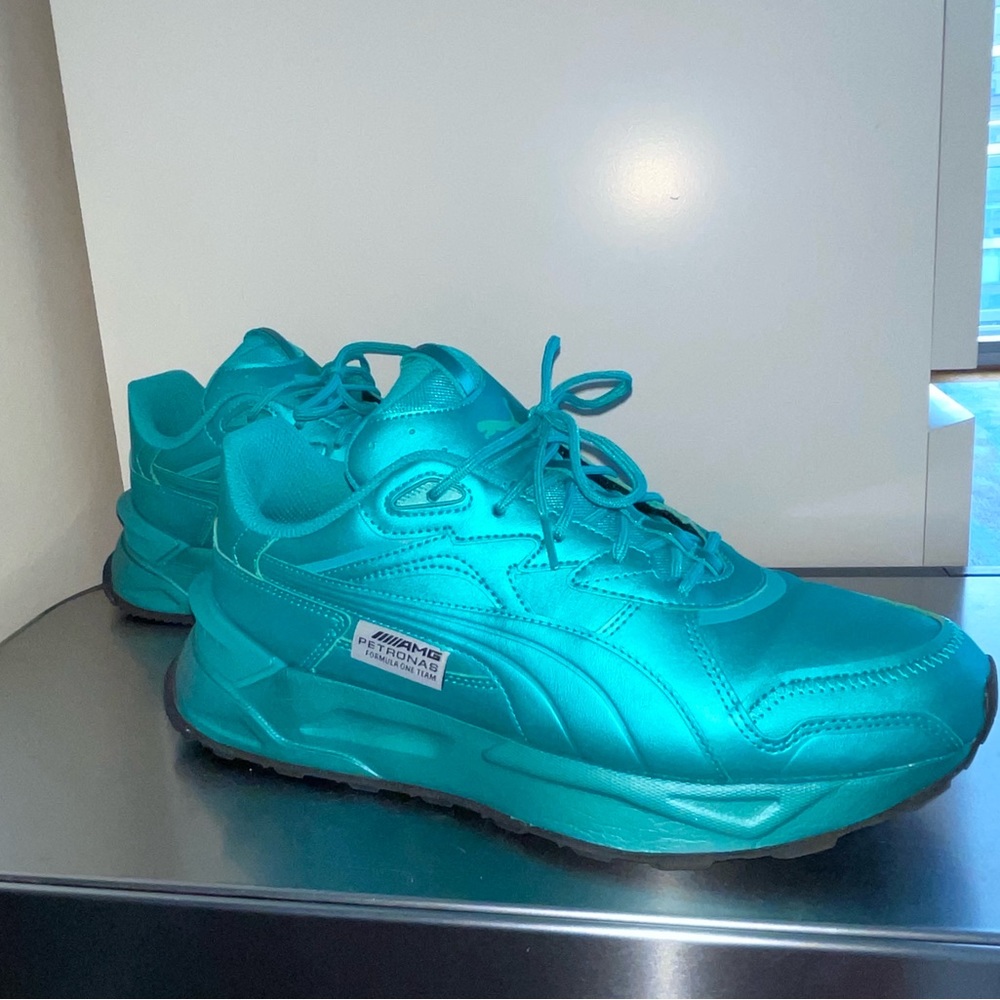 Metallic teal Mercedes Pumas